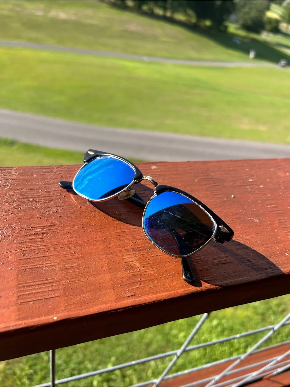 Ray-Ban Clubmaster Black Frame with Blue Mirrored Lenses Sunglasses